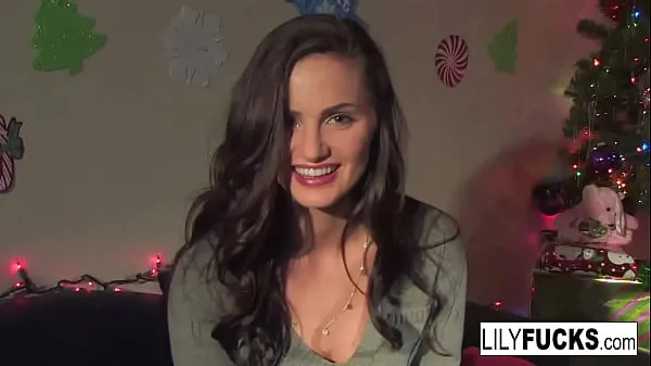HD Lily tells us her horny Christmas wishes before satisfying herself in both holes top Tube